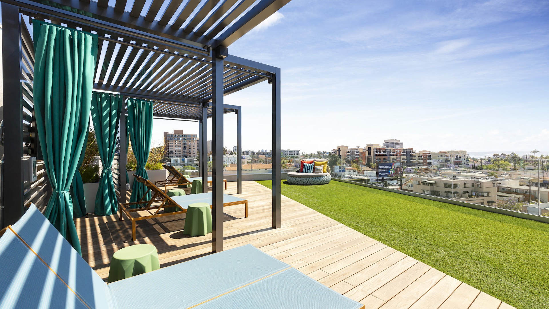 Rooftop deck chaise lounges and event lawn