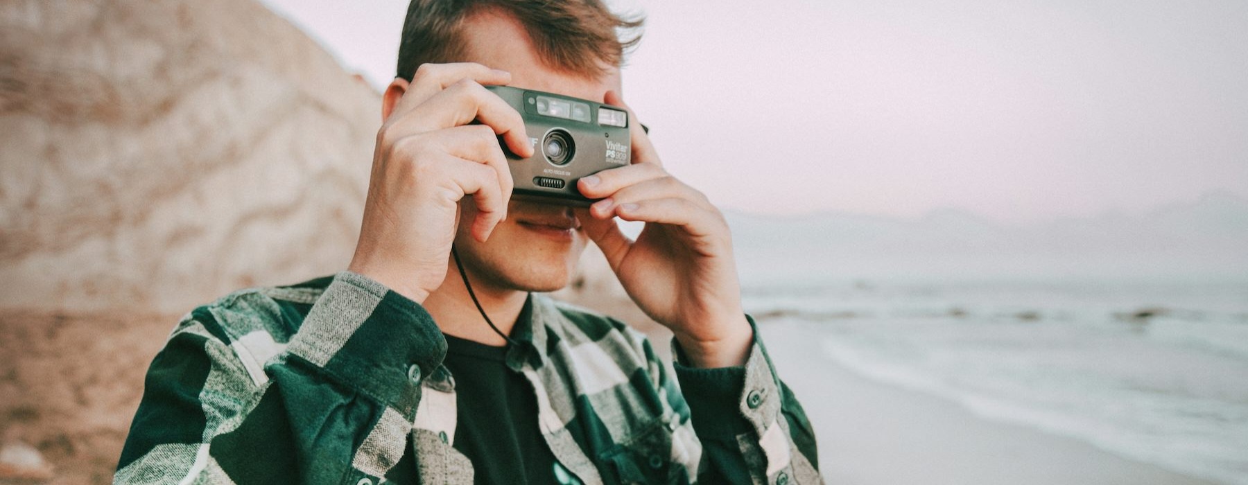 a person holding a camera