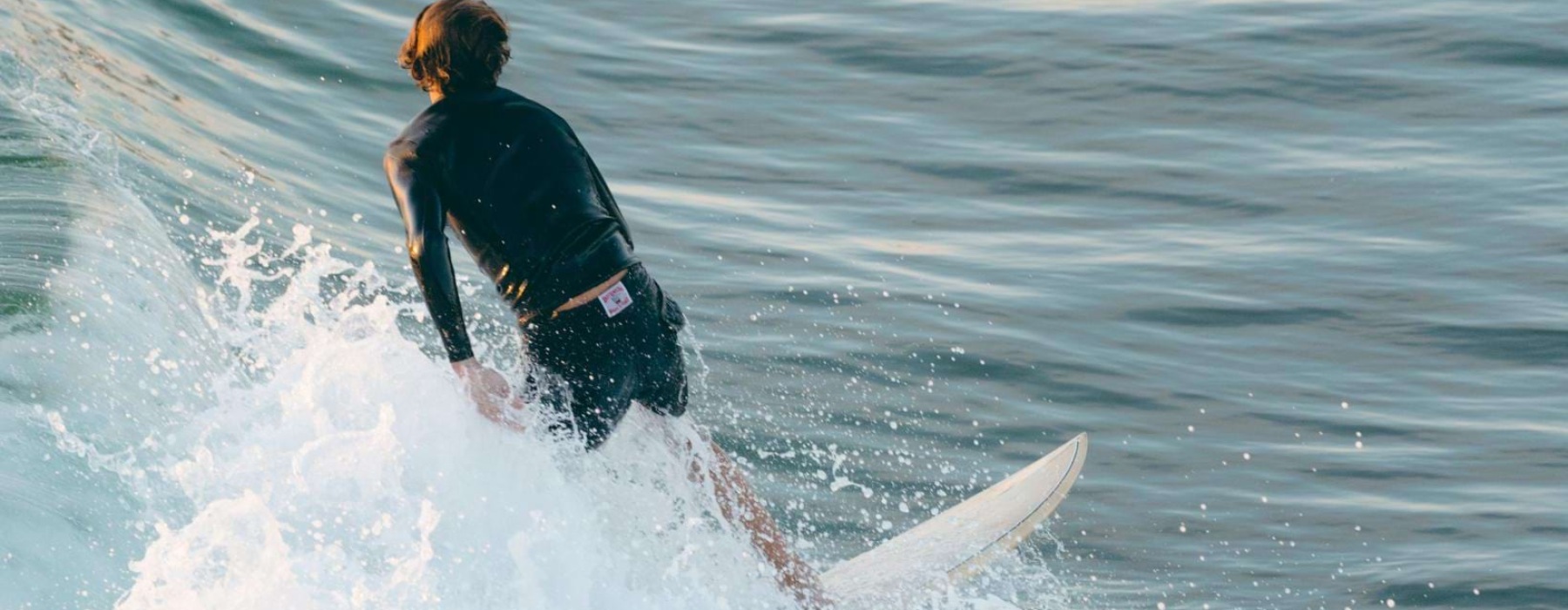 a man surfing on the waves